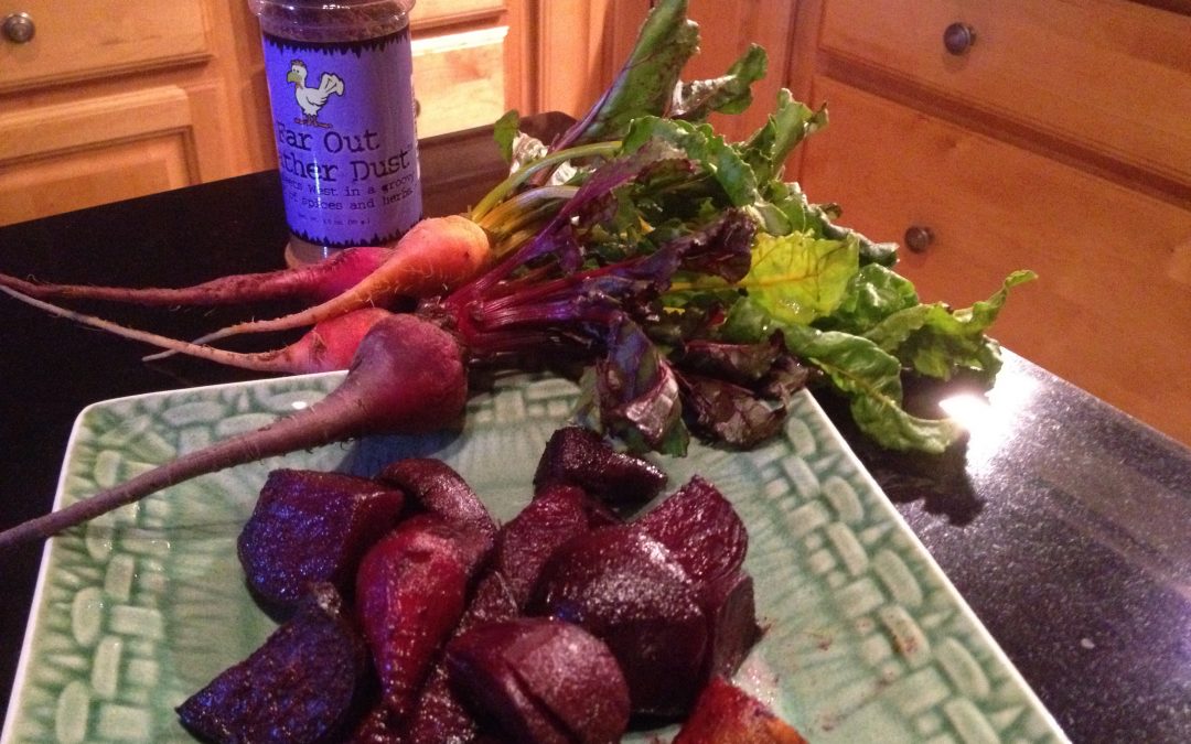 Roasted beet chunks on green ceramic plate