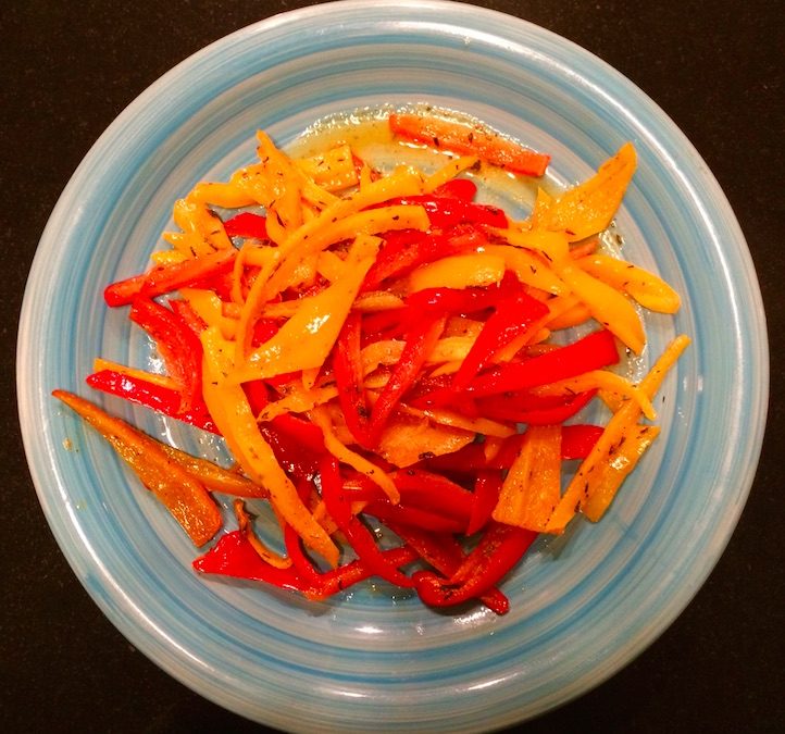 Sautéed red and yellow bell pepper strips