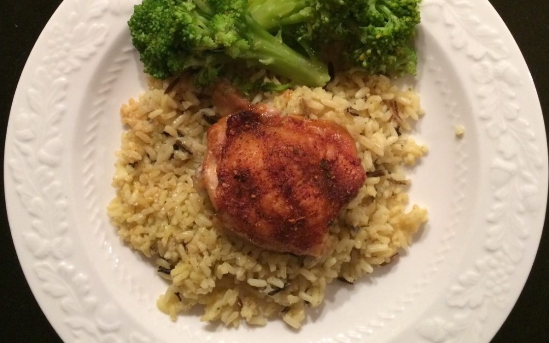 Roasted chicken thigh on rice with broccoli