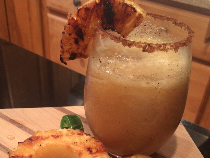 Grilled pineapple frozen cocktail with cinnamon rim