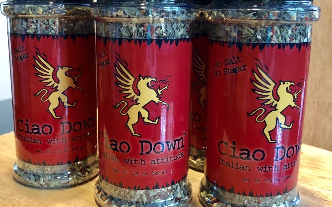 Three Ciao Down spice jars on wooden surface