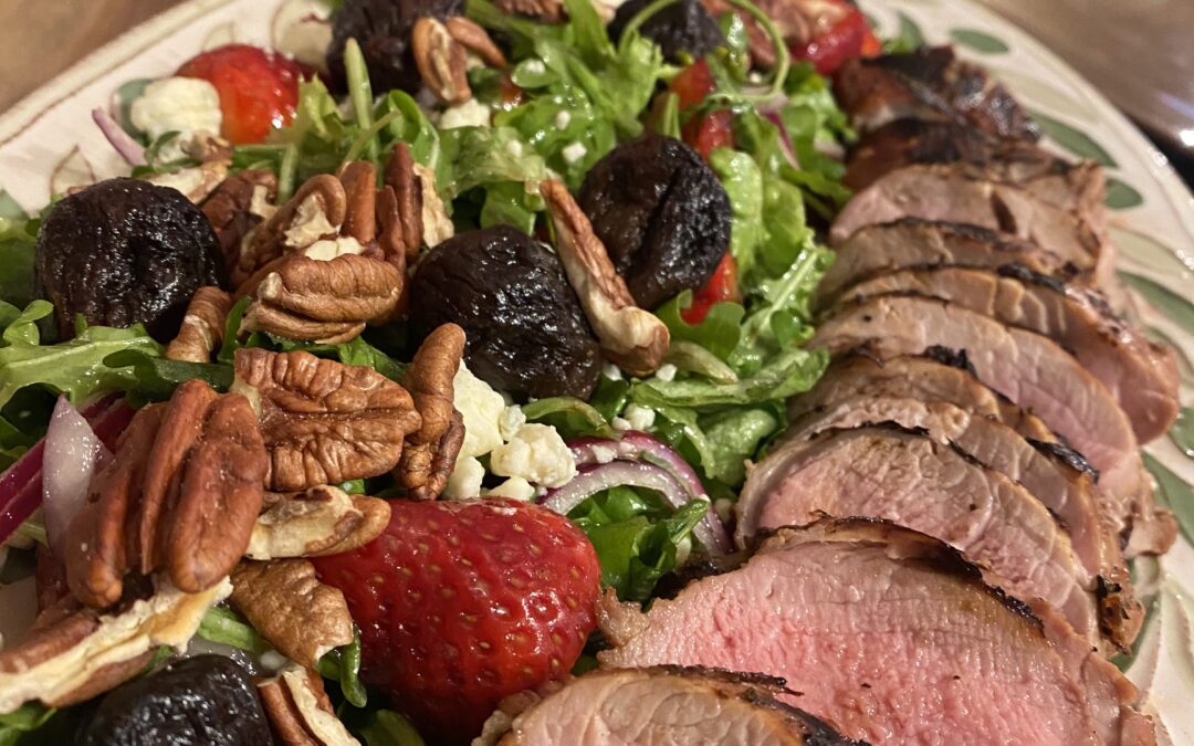 Grilled Pork and Figs served over Strawberry Salad Greens